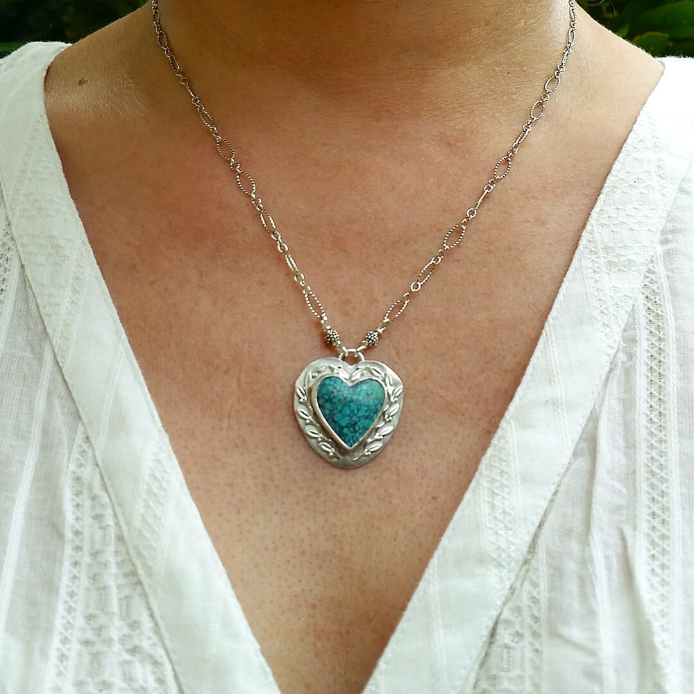 Nature-inspired Turquoise Heart Necklace with Leaves and vines in Sterling Silver