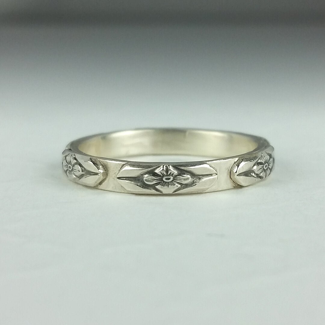 woman's floral wedding ring  in sterling silver