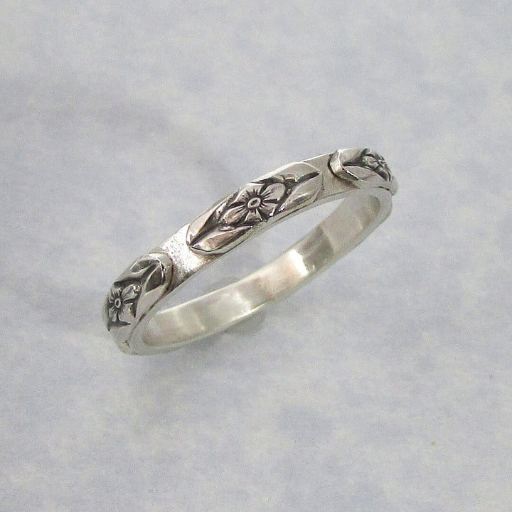 Victorian style woman's floral wedding band