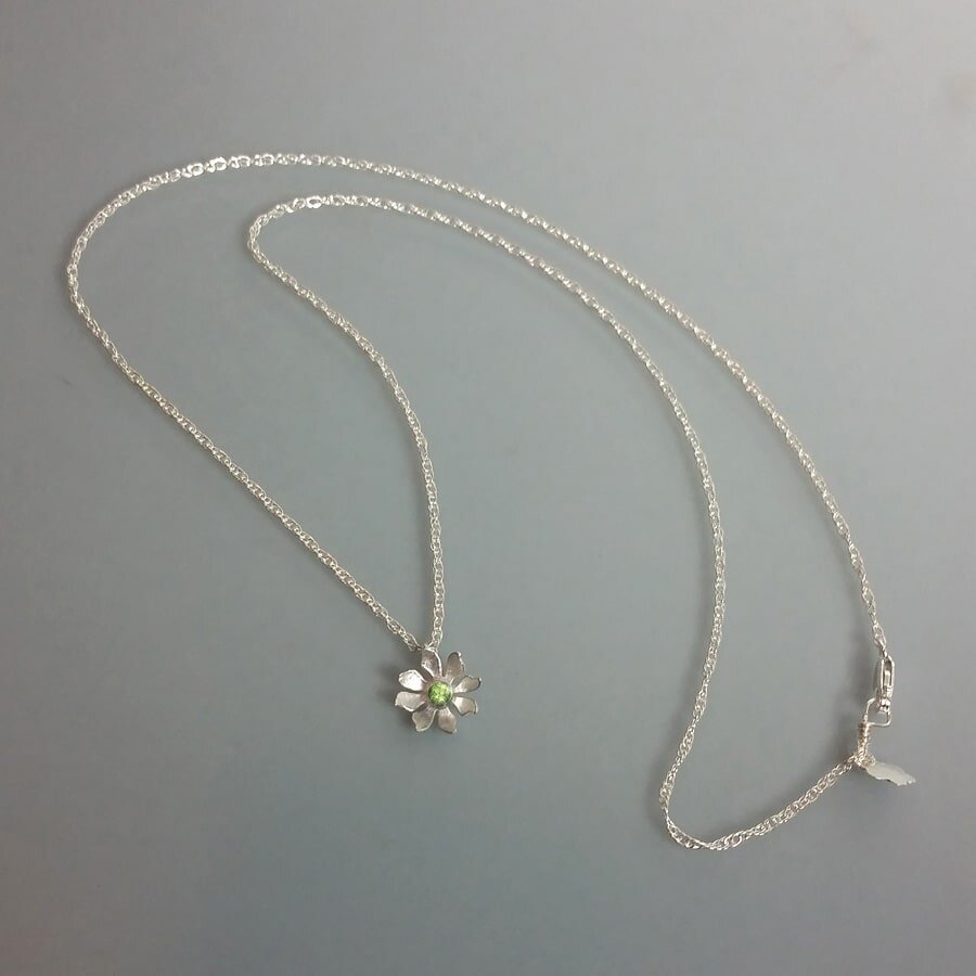 Small wildflower pendant necklace with peridot in sterling silver