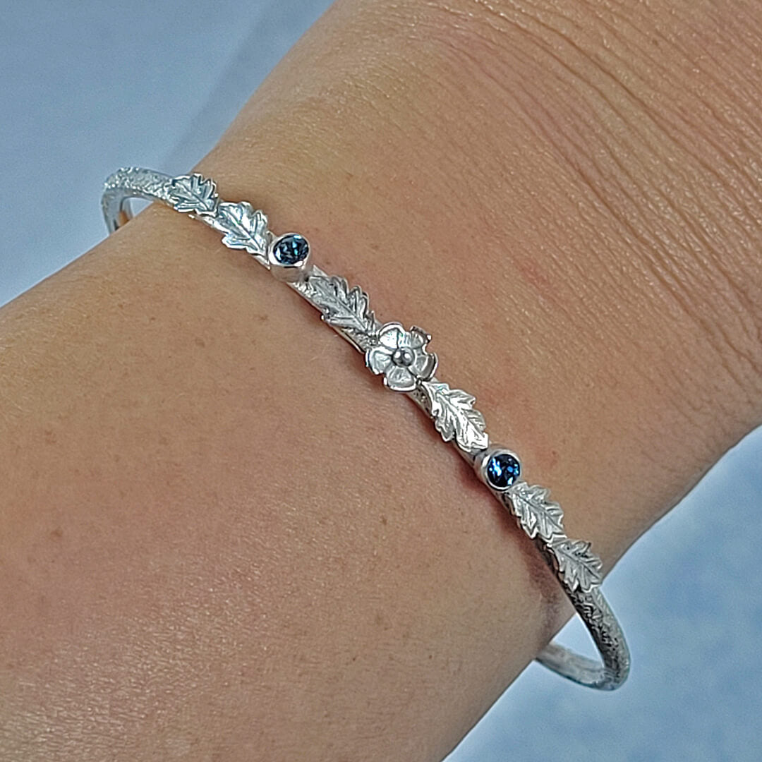 Winter garland leaf and flower sterling silver cuff bracelet bracelet with blue topazflower