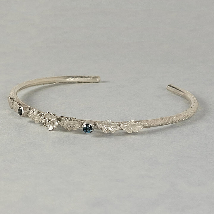Sterling silver cuff bracelet with London blue topaz, nature-inspired