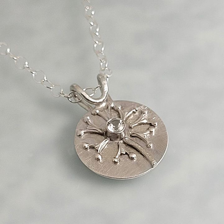 Wish dandelion necklace in sterling silver with white topaz